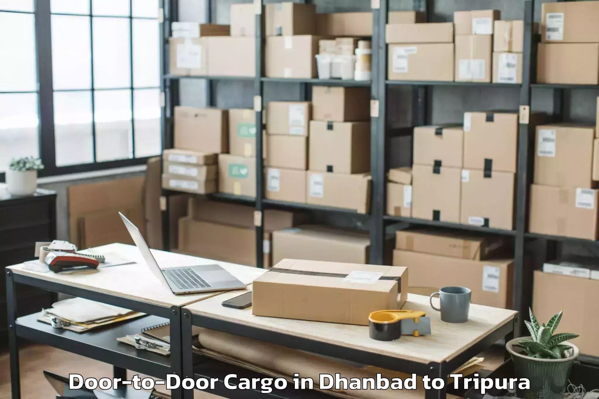 Dhanbad to Manughat Door To Door Cargo Booking